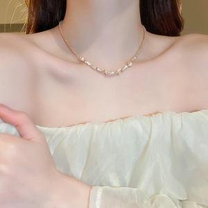Close-up of colorful freshwater pearl choker on model neck for a delicate look