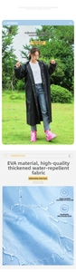 Close-up of thick waterproof EVA raincoat with drawstring hood and durable dry-tech texture