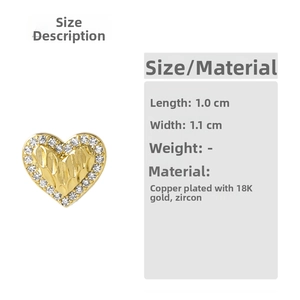 Detailed view of 18K gold plated heart studs with zircon inlays and 1.0cm x 1.1cm dimensions