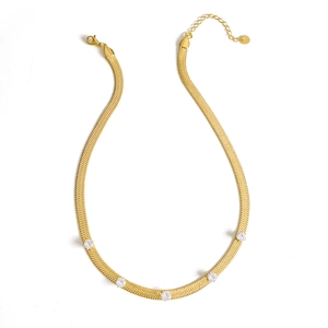 Minimalist gold snake chain necklace with five inlaid zircons on a white background