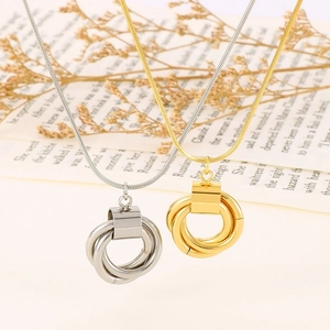 Gold and silver interlaced triple ring pendants on sleek snake chains in retro setting