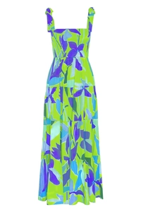 Detailed close-up of smocked bodice and tie-shoulder straps on floral maxi dress