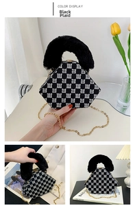 Detail of a hexagonal handbag featuring black M-pattern fabric and plush faux fur handle