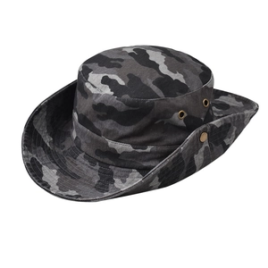 Detail view of camouflage boonie hat featuring side metal eyelets and press buttons