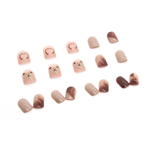 Caramel bear press-on nails with heart designs and brown marble gradient finish