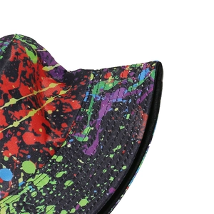 Macro shot of colorful graffiti bucket hat showing durable twill fabric and stitching