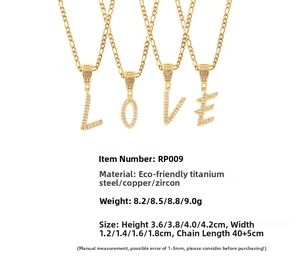 Detail showing gold-plated titanium steel letter pendants with micro-pave zircon crystals