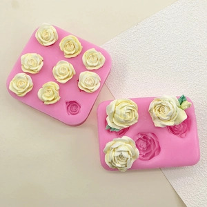 Pink silicone rose flower mold set for fondant and baking with detailed floral patterns