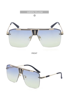 Detail of square pilot sunglasses with gradient blue-yellow lenses and golden metal frame
