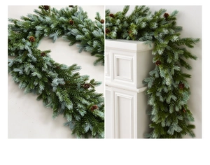 Detail of luxury frosted Christmas garland with PE needles and natural pine cones