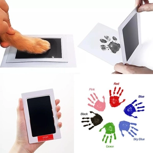 Inkless baby and pet paw print kit with multi-color ink pads and clean-touch design