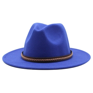 Detail of royal blue wool jazz hat with a brown braided leather band decoration