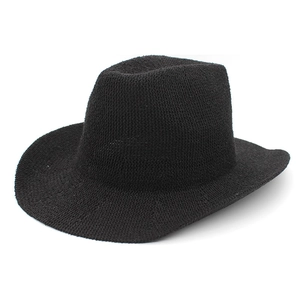 Classic black knitted Panama hat with fine woven texture and flat brim for unisex wear