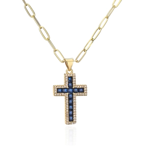 Detail of 18K gold-plated paperclip chain with a blue zircon cross pendant