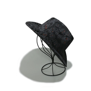 Black jazz top hat with skull patterns and red glitter accents for Halloween party wear