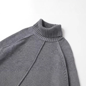Chunky knit sweater in heather gray with ribbed turtleneck and raglan sleeve detail