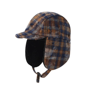 Plaid trapper hat for boys featuring distressed details and warm fleece lining