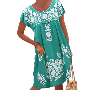 Turquoise short sleeve dress featuring white floral embroidery and ethnic round neckline