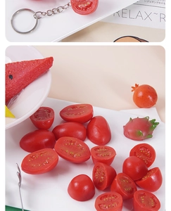 Close-up of realistic cherry tomato keychain showing detailed cross-section texture