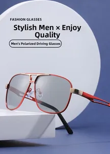 Detail view of aviator polarized driving sunglasses with a red metal frame and cut-out temples