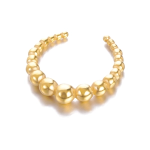 Detailed view of an open golden bead bracelet with a polished mirror gradient finish