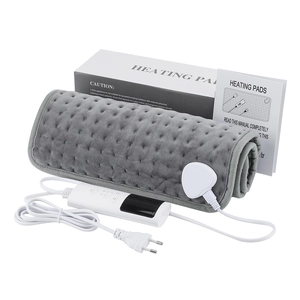 Detail view of the gray plush heating pad with its digital controller and EU plug power cord