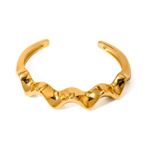 Polished 18k gold plated stainless steel chunky wavy open bangle with a glossy finish