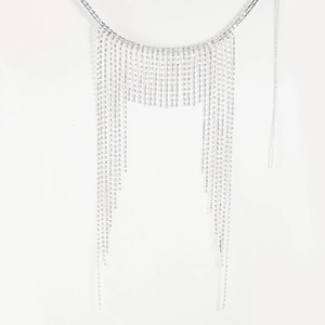Elegant silver rhinestone body chain headwear with shimmering tassel fringe on white backdrop