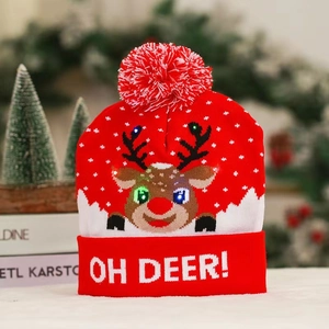 Close-up of red knitted Christmas hat with LED reindeer pattern and Oh Deer text