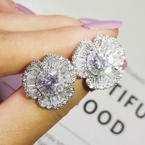 Classic camellia flower stud earrings with purple cubic zirconia in silver metal plating