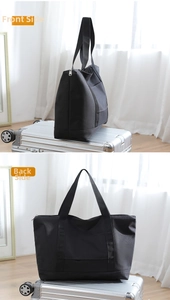 Detail of durable black nylon travel bag showing side and back view on a suitcase