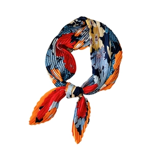 Pleated square neck scarf with colorful floral print and elegant silky fold texture