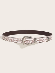 Close-up of white fashion belt with brown butterfly prints and vintage silver buckle