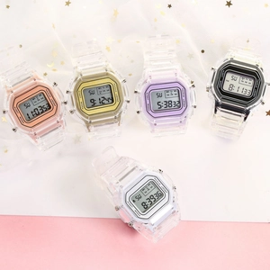 Flat lay of five transparent digital sports watches in assorted dial colors with LED display