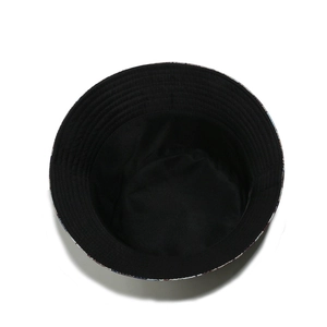 Detail view showing black lining and precision stitching on sun hat brim