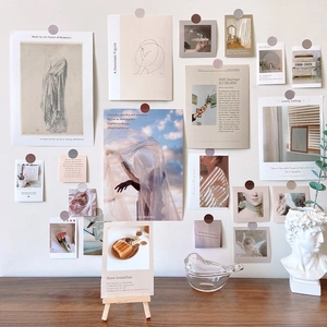 Ins style wall decoration kit featuring artistic cards and photos on a beige wall