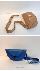 Detail of half-moon crossbody bags with lychee texture and dual zippers