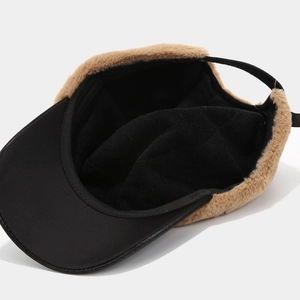Winter plush navy hat with khaki faux fur trim and black visor for women stylish warmth