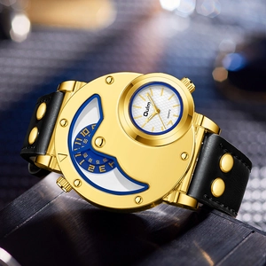 Detailed macro view of the gold quartz watch face with blue sub-dials and black leather strap