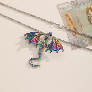 Detailed close-up of an iridescent dragon pendant necklace with sparkling crystal rhinestones