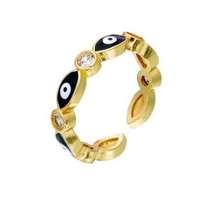 Detailed close-up of 18K gold-plated evil eye ring with white zircon stones and enamel