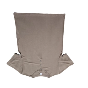 Macro detail of men's taupe ribbed knit henley shirt featuring a three-button placket
