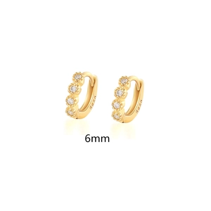 Detailed macro view of 6mm S925 sterling silver gold hoop earrings with small crystals