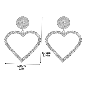 Sparkling oversized heart-shaped rhinestone earrings with detailed dimensions 8.75cm by 6.86cm