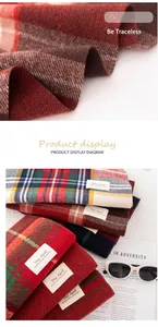 Close-up of thick red plaid cashmere scarf detail with seamless stitched edges