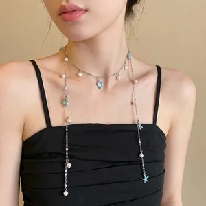 Blue starfish and conch pearl tassel necklace for a fresh summer beach vacation style