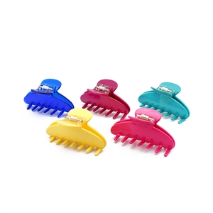 Set of five vibrant solid color acetate hair claw clips for versatile daily styling