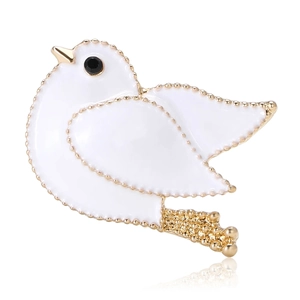 Elegant white enamel pigeon brooch with gold metal accents and black gemstone eye decor