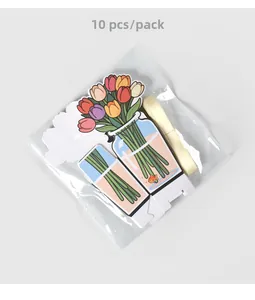 Detail of 10 tulip themed bookmarks with elegant yellow ribbons in clear packaging
