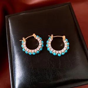 Gold plated vintage hoop earrings with blue turquoise and cubic zirconia stones